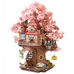 Rolife Sakura Tree House TGS04 wooden 3D puzzle with pink cherry blossoms, spiral stairs, hanging chair and yellow basket