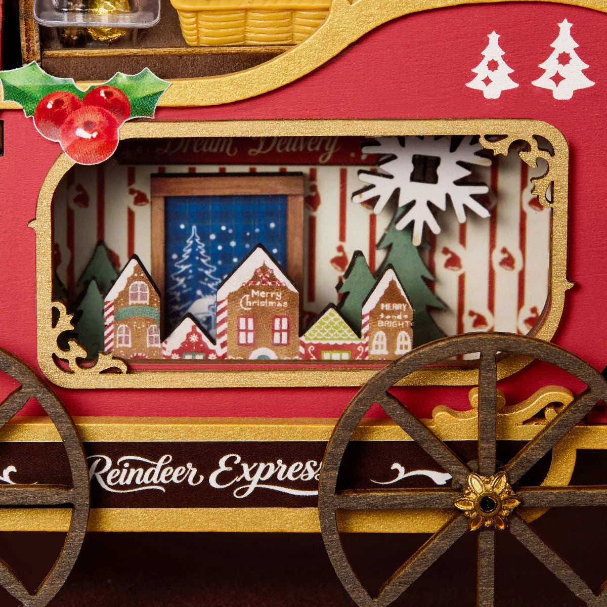 Close-up of the Rolife Reindeer Express DS059 red-and-gold carriage window with miniature village scene