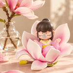 Example Rolife Nanci Flower Stories figure nestled in pink petals beside magnolia blossoms. Blind-box design varies.